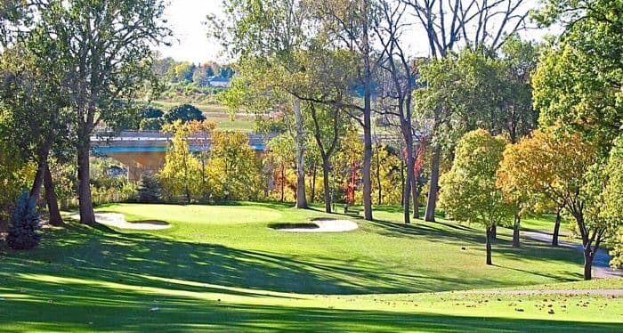 A par-three green on a championship parkland course